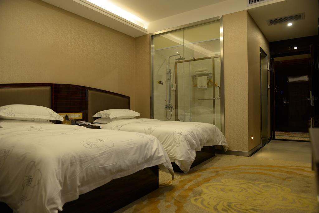 Tie Cheng Hotel Guangzhou Rum bild
