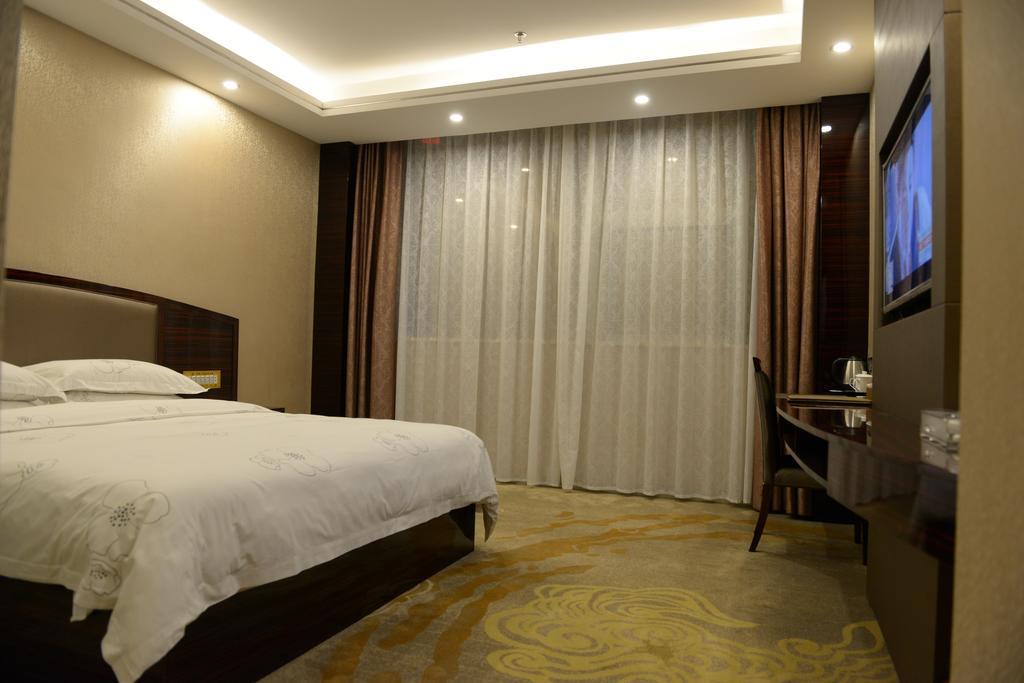 Tie Cheng Hotel Guangzhou Rum bild
